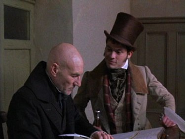Actor Patrick Stewart plays Scrooge and Dominic West plays Scrooge's nephew, Fred, in the 1999 TNT adaptation of A Christmas Carol.